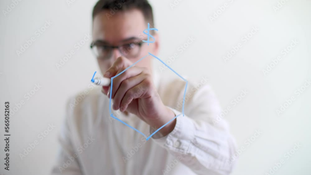 Handsome analyst explaining new project strategy to his colleagues on a meeting. Businessman in his 30s using a glass board. High quality 4k footage Handsome analyst explaining new project strategy to his colleagues on a meeting. Businessman in his 30s using a glass board. High quality 4k footage
