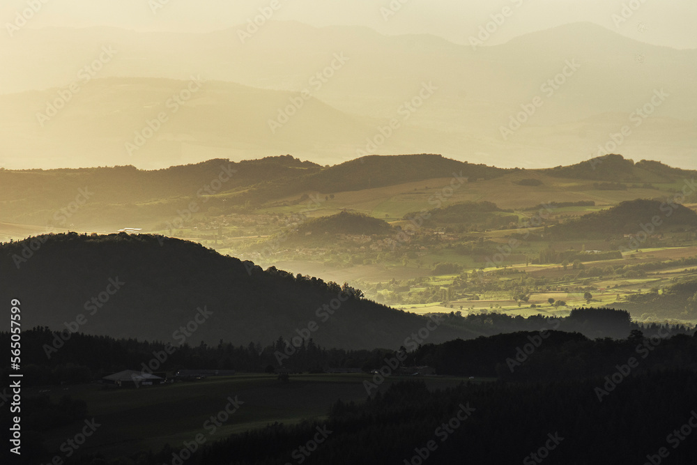 artistic view on the sunset oo the volcano mountains of the French region Auvergne
