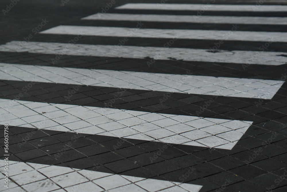 Walking path with white lines, zebra paths