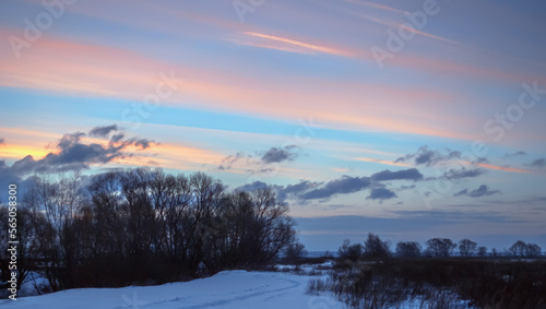 Winter Evening Sky with Pink and Purple Clouds in Countryside © Svetlana Sukhorukova