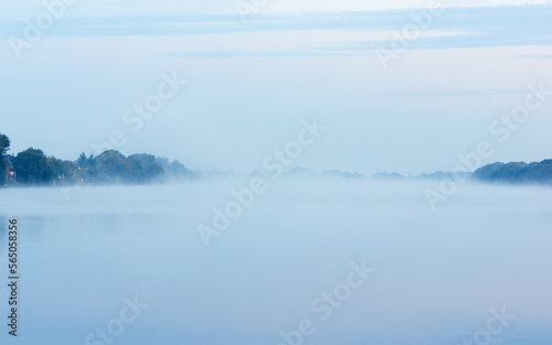 Dense Fog over the River in the Morning