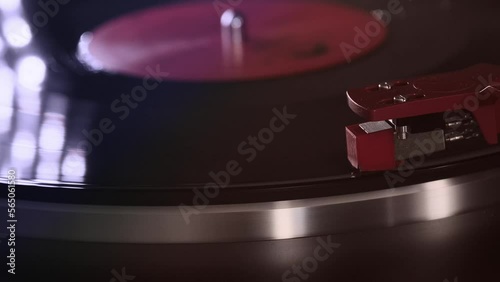 pickup head on vinyl record, analogue retro music concept, hobby of collecting vinyl music discs, audio experience, musical enjoyment, vintage technology, smooth passage of camera, video, 4K photo