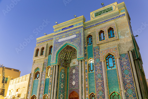 Ali Ibn Abi Talib Mosque (Iranian Mosque Hosainia), colorful Shia Iranian mosque in Bur Dubai, Deira with Persian faience tilework and Islamic calligraphy. photo