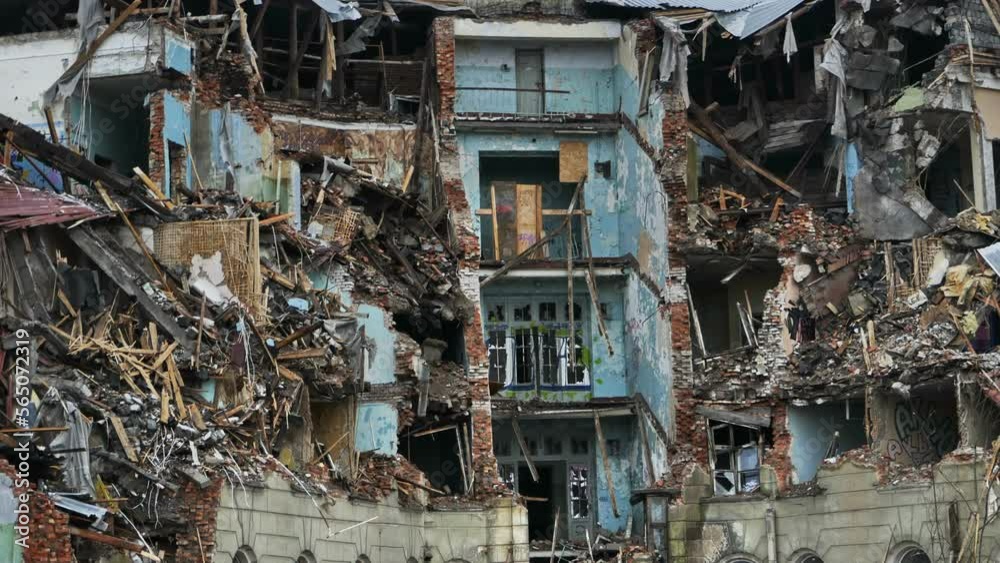 ruins of the building after a explosion bombing, zoom out