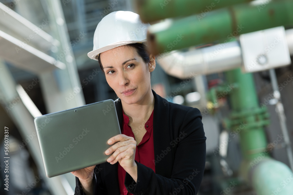 famale architect at work on site with tablet famale architect at work on site with tablet