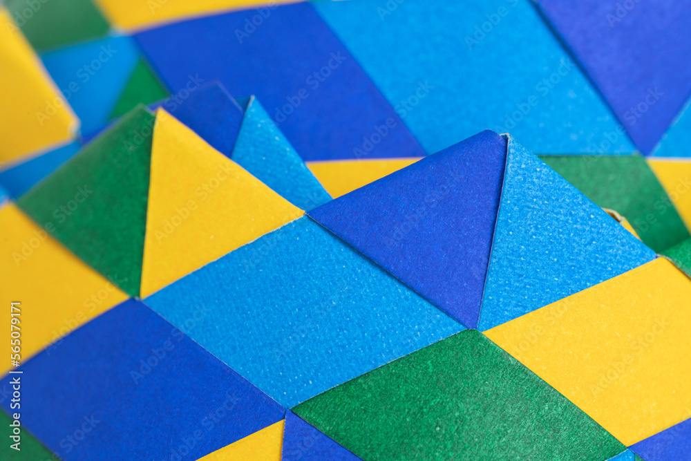 Background abstract geometric design triangle vivid color blue yellow and green weave element wallpaper graphic pattern.Modern fashion style website banner poster,minimal creative desktop backdrop. Background abstract geometric design triangle vivid color blue yellow and green weave element wallpaper graphic pattern.Modern fashion style website banner poster,minimal creative desktop backdrop.