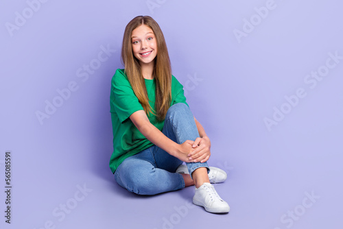 Canvas Print Photo of glad cute lady sitting floor dressed comfort clothes empty space isolat