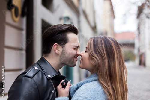 stylish happy couple enjoying a date on the street of a European city