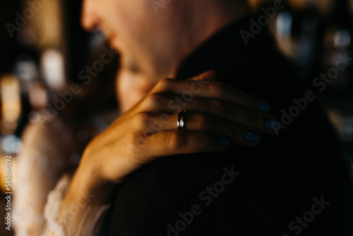 Wedding couple in love holding hands on their wedding day © Cavan