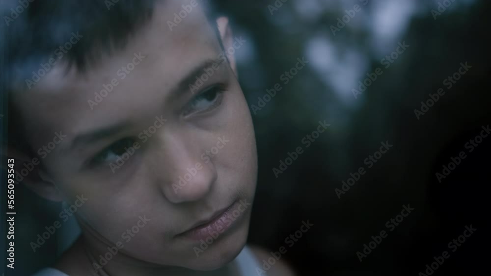 lonely sad depressed boy near the window, alone boy sitting at the window, cinematic steadicam shot lonely sad depressed boy near the window, alone boy sitting at the window, cinematic steadicam shot