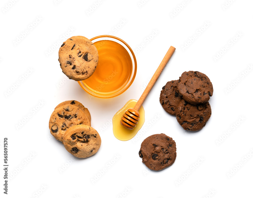 Honey and homemade cookies on a white background top view. Honey and homemade cookies on a white background top view.
