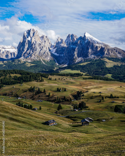 View across alpine valley to the Alpe di Siusi range in the Dolomites