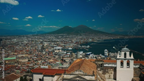 Naples, Italy - 12.06.2022: Old city of Naples and volcano Vesuvius. photo