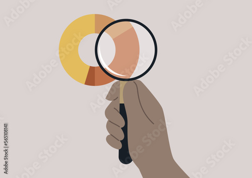 Market research, examining a pie chart with a magnifying glass
