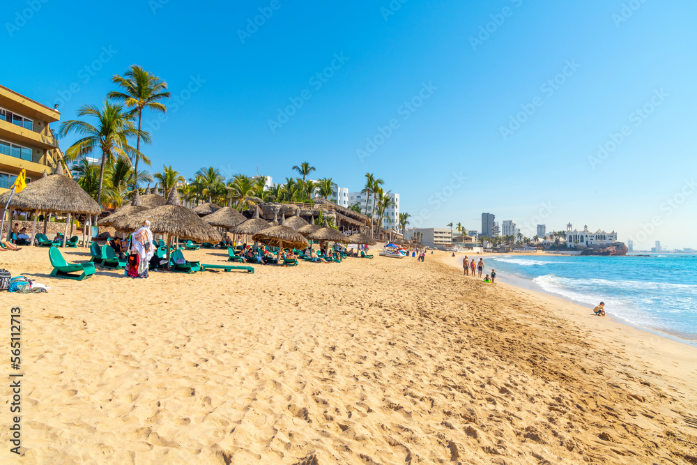 An oceanfront resort offers private huts and cabanas along the sandy Playa Gaviotas beach in the Golden Zone of Mazatlan, Mexico, along the Sinaloa Riviera.