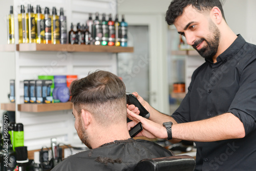 salon. close-up of a male haircut, master in a barbershop