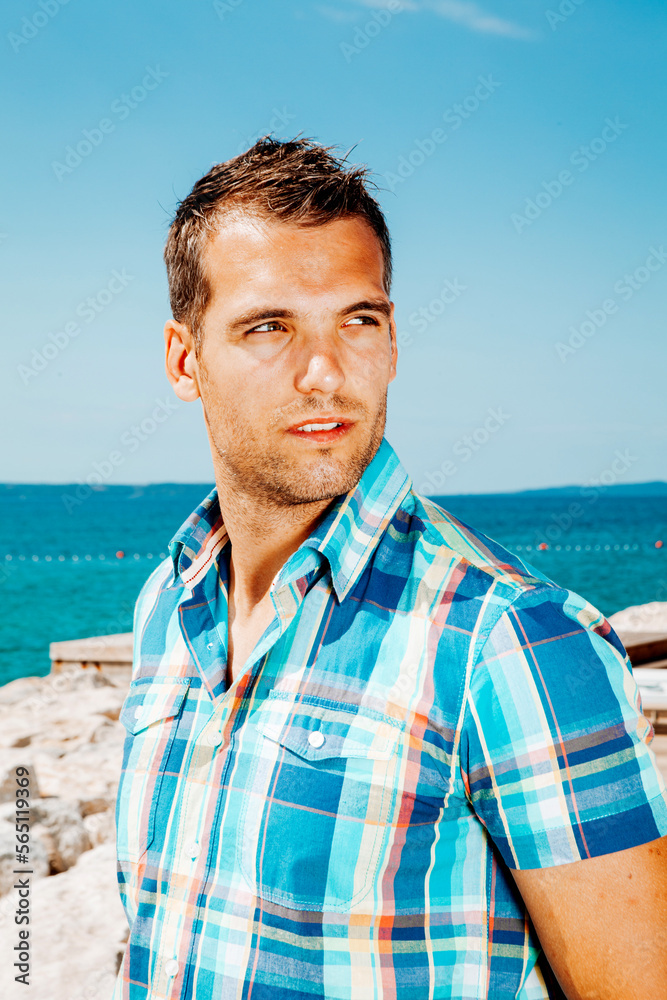 Fototapeta premium Man standing on the beach