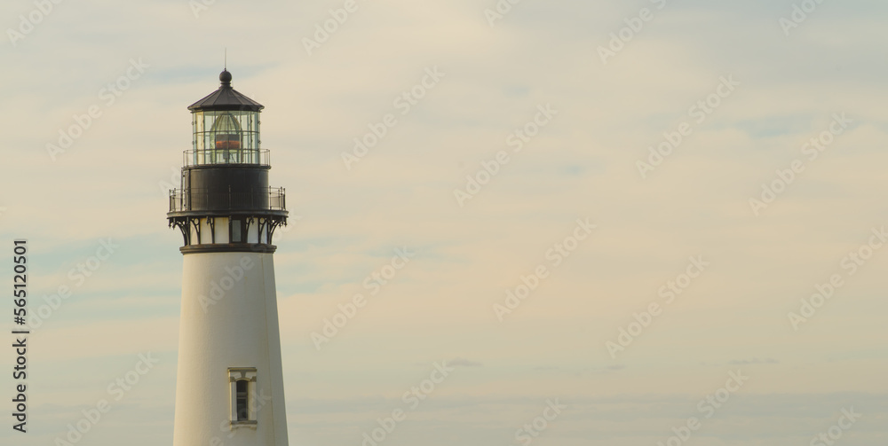 White lighthouse tower under cloudy sky. Minimalism. Navigation, weather, nature. There is free space to insert. Romance, excursions, history, architecture. White lighthouse tower under cloudy sky. Minimalism. Navigation, weather, nature. There is free space to insert. Romance, excursions, history, architecture.