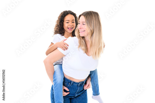 Woman in light clothes have fun with cute child girl 5 years old