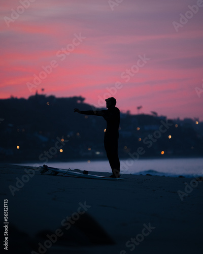person at dusk on the beach © Jakob