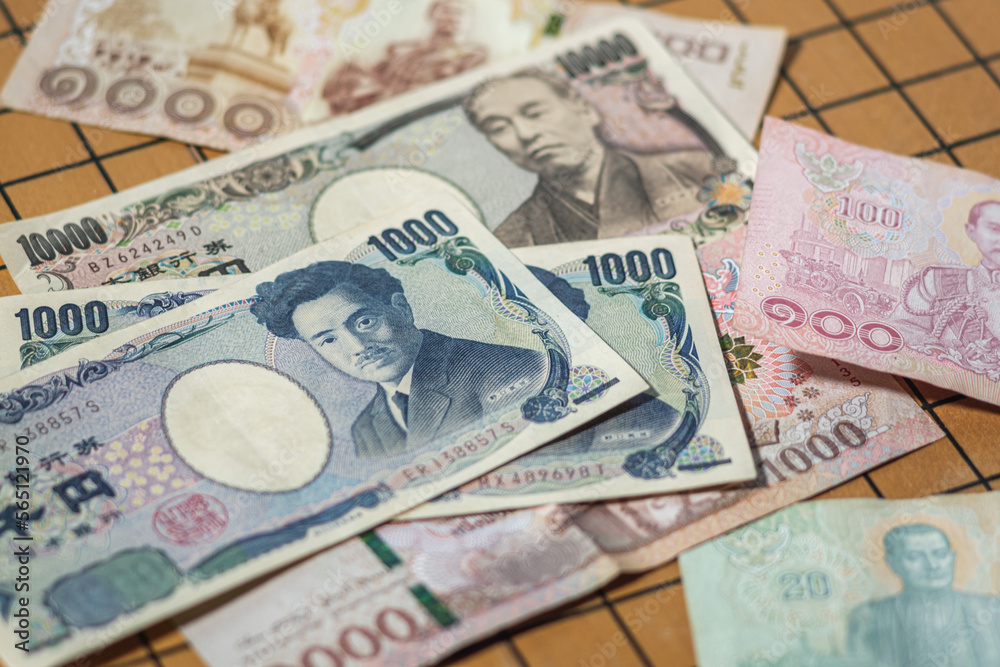 Bank note of thailand and japan currency economic symbol Bank note of thailand and japan currency economic symbol