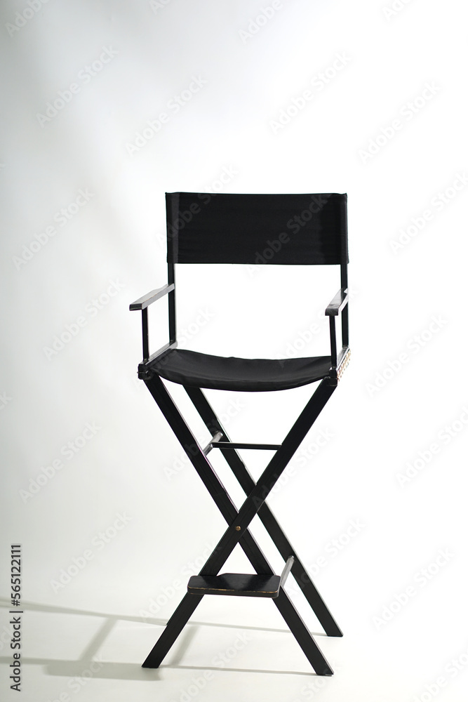 Black wooden folding chair on a white background. Black wooden folding chair on a white background.