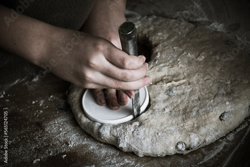 hands baking bread together