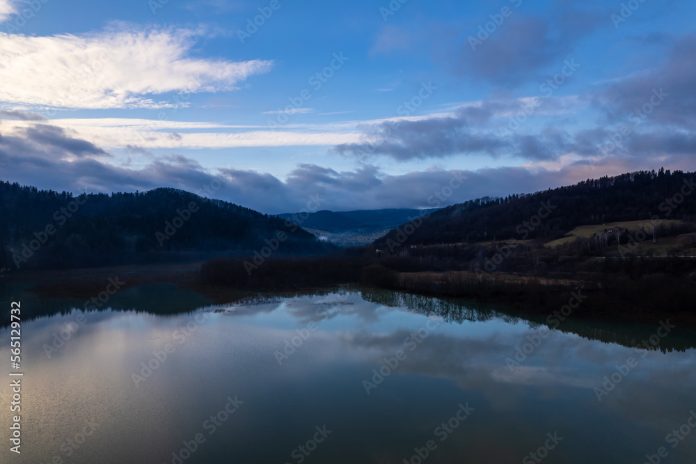 Bieszczady mountains. Cloudy sunrise in the mountains. Moody morning in the mountains. Sun through the clouds in the mountains. Sunrays in mountains.