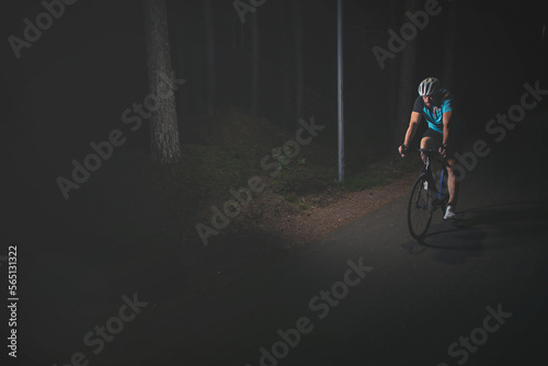 Night training of an athlete on a bike