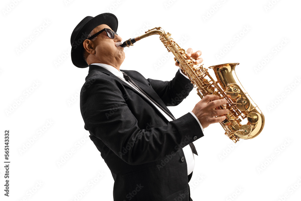 Fototapeta premium Profile shot of a mature elegant musician playing sax
