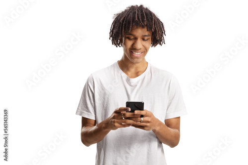 Afro american young man using a smartphone and smiling