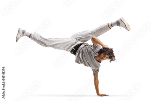 Afro american male dancer performing a handstand