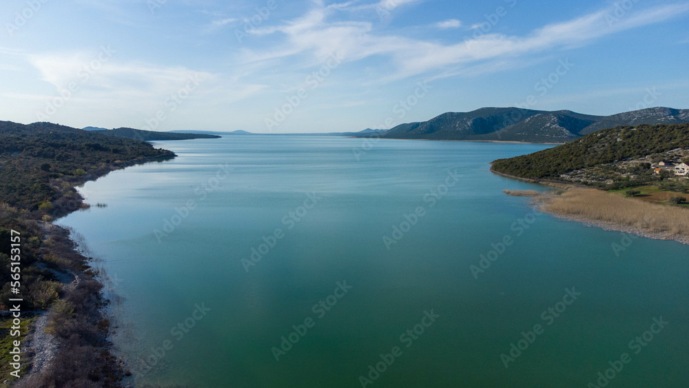 Vransko lake in Dalmatia, Croatia from above with views on Adriatic sea and islands. Vransko lake in Dalmatia, Croatia from above with views on Adriatic sea and islands.