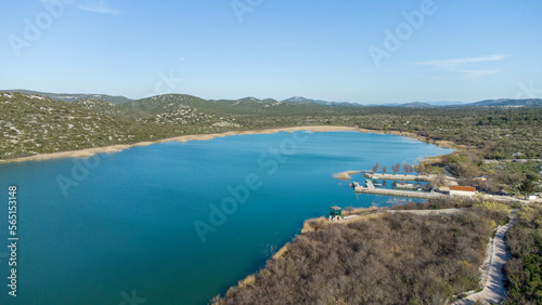 Vransko lake in Dalmatia, Croatia from above with views on Adriatic sea and islands.