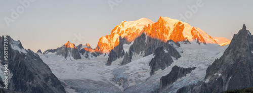 The panorama of Mont Blanc massif and Aiugulles towers in the morning light.
