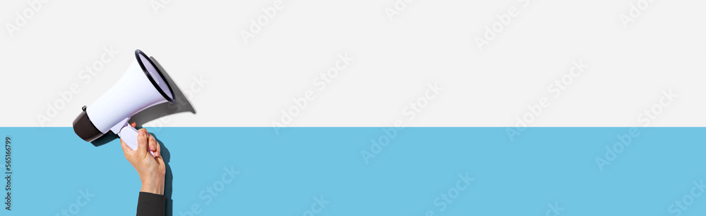 Fototapeta premium Attention and announcement concept with a megaphone