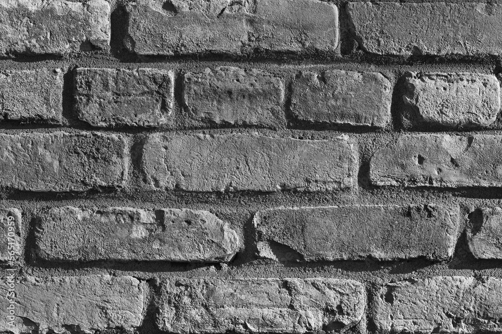 gray background, on the photo is a gray brick wall close-up gray background, on the photo is a gray brick wall close-up
