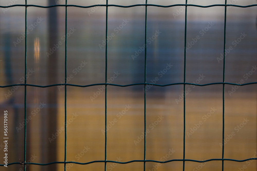 metal mesh, in the photo a fence made of mesh close-up metal mesh, in the photo a fence made of mesh close-up