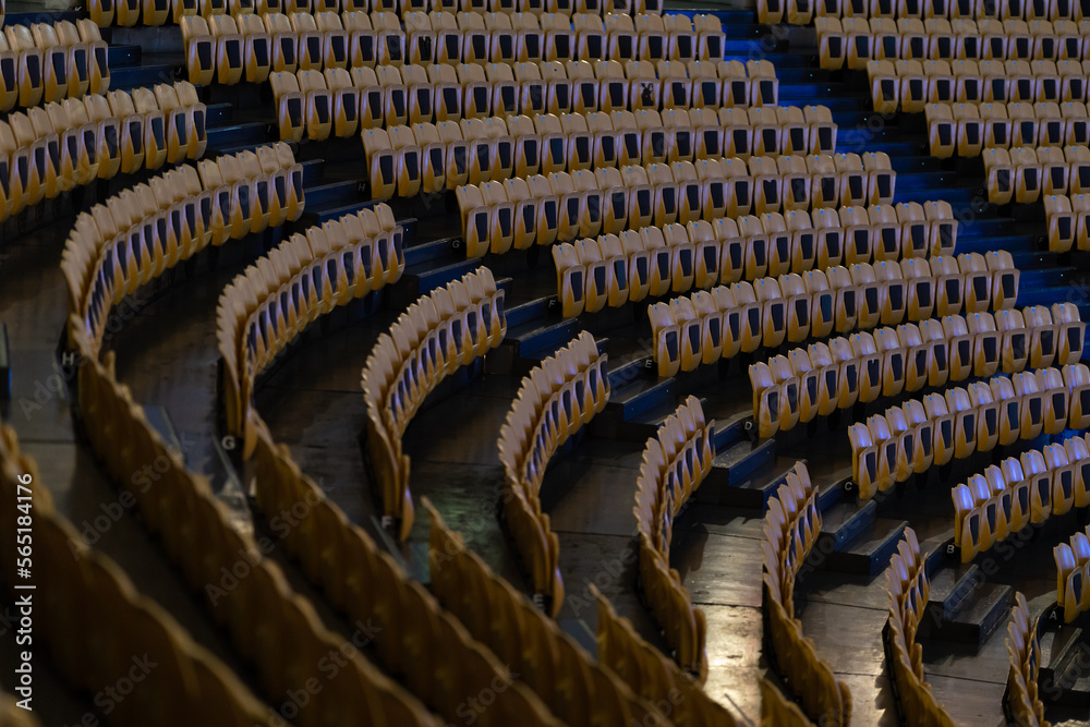 Fototapeta premium Empty seats in a large empty rounded hall