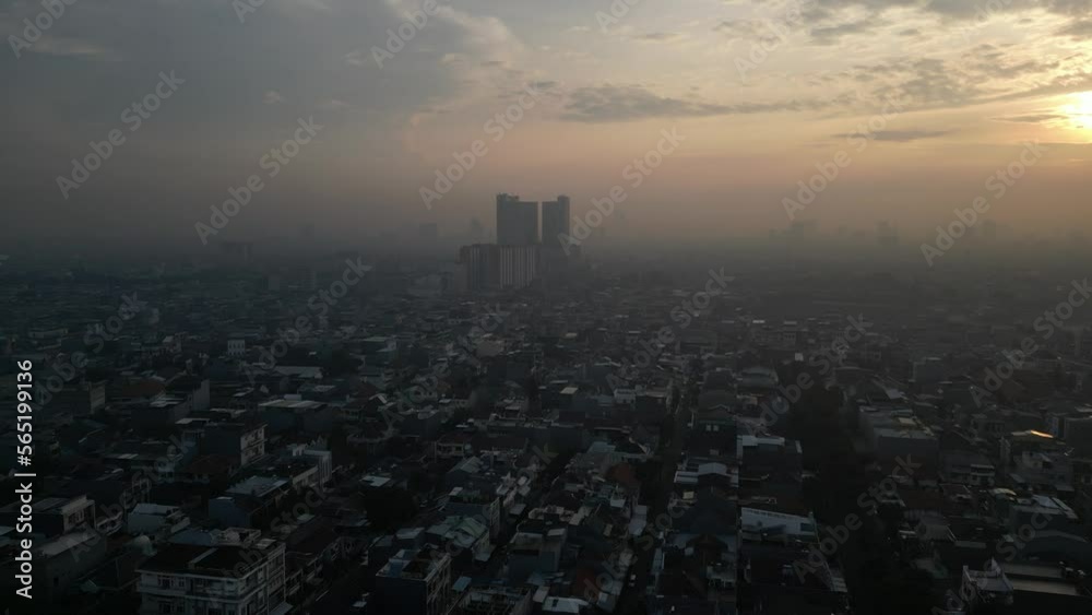 Drone sky view of crowded houses in the big mega capital city where people live, work and play Drone sky view of crowded houses in the big mega capital city where people live, work and play
