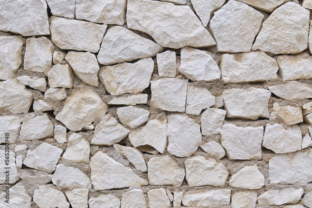 Obraz premium Stone fence wall texture, panoramic garden stonewall, limestone dolomite white slate slab rock texture. abstract background