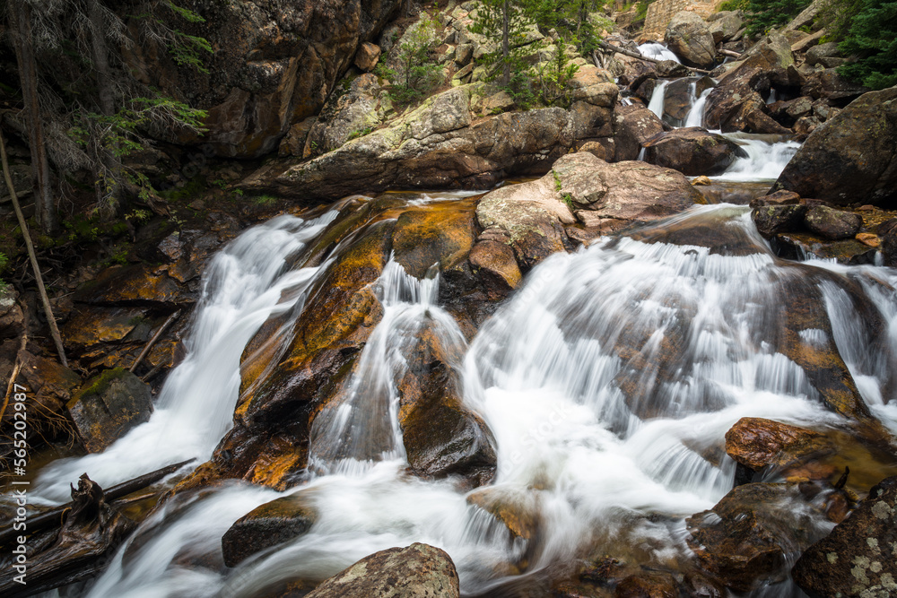 Mountain Chasm With Rushing Rive The Fall River flows through the giant granite boulders that make up ...