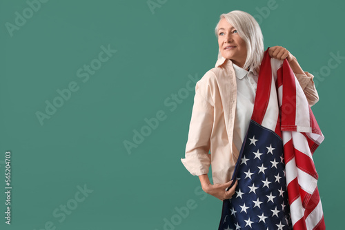Mature woman with USA flag ...