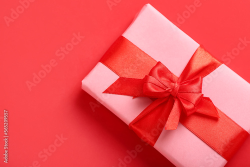 Gift for Valentine's Day celebration on red background