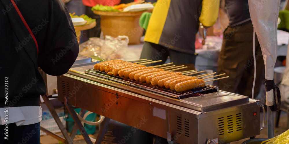 Isaan sausages. Thai street food night market.