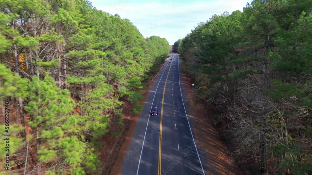 Flying a drone over a road leading to Paris Landing located in Tennessee Flying a drone over a road leading to Paris Landing located in Tennessee