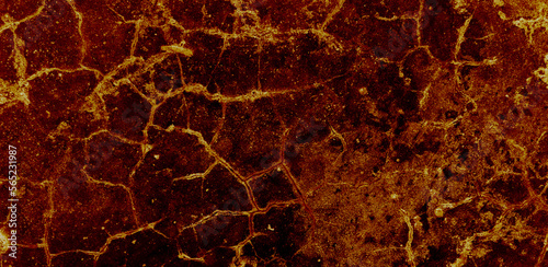 Dark background of cracked and eroded concrete wall.Abstract texture dark colored spooky but with character.