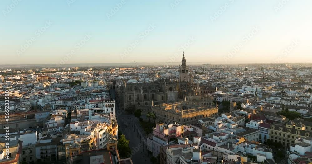 Aerial Towards The Seville Cathedral Next To The General Archive Of The Indies At Sunrise In Sevilla, Spain. Aerial Towards The Seville Cathedral Next To The General Archive Of The Indies At Sunrise In Sevilla, Spain.