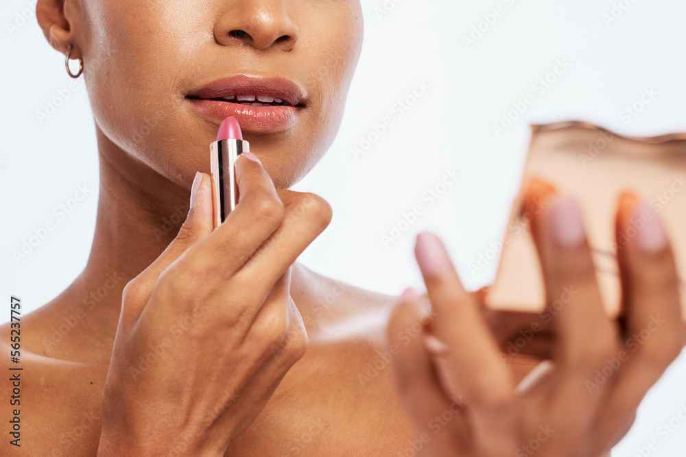 Makeup, lipstick and woman lips with cosmetics product and mirror isolated in studio white background. Face, dermatology and creative model with elegant and smooth skin as self care routine Makeup, lipstick and woman lips with cosmetics product and mirror isolated in studio white background. Face, dermatology and creative model with elegant and smooth skin as self care routine