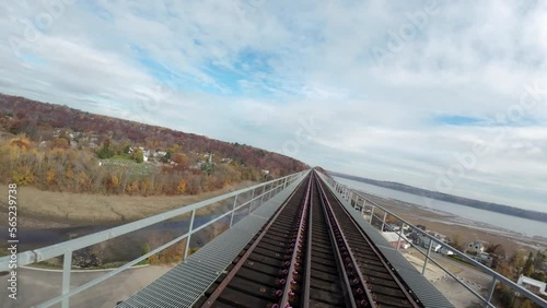 FPV drone following railroad bridge and going under it 1